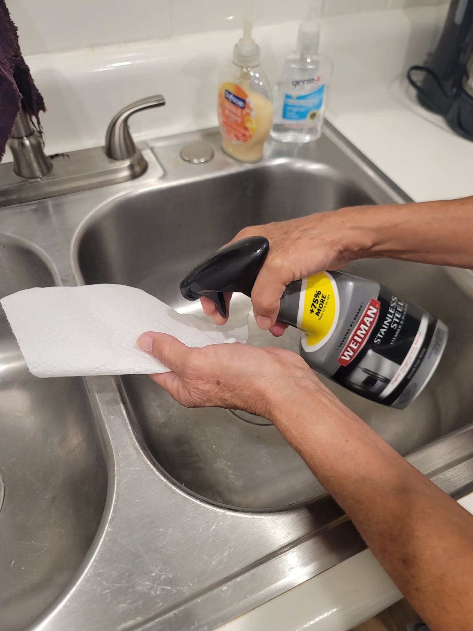 Cleaning and polishing a kitchen sink and faucet